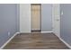 This bedroom has new laminate flooring, closet, and fresh paint at 14734 11Th St, Dade City, FL 33523