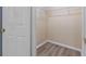 Walk-in closet with wire shelving and wood-look flooring, ready for your storage needs at 14734 11Th St, Dade City, FL 33523