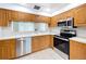 Modern kitchen with updated appliances and plenty of counter space at 1535 Nursery Rd # 107, Clearwater, FL 33756