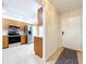 Bright kitchen boasts stainless steel appliances and ample counter space at 1535 Nursery Rd # 107, Clearwater, FL 33756
