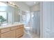 Bathroom with shower, tub, and vanity with neutral counter at 16501 Sandhill Crane Dr, Spring Hill, FL 34610