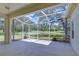 Spacious screened lanai offers serene outdoor living at 16501 Sandhill Crane Dr, Spring Hill, FL 34610