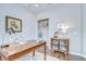 Home office with hardwood floors, closet, a storage cabinet, and decor at 16501 Sandhill Crane Dr, Spring Hill, FL 34610