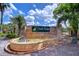 Quail Ridge entrance sign with brick and fountain at 16501 Sandhill Crane Dr, Spring Hill, FL 34610