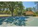A community basketball court offers a place to play and exercise outdoors for the Gathering at 17712 Long Ridge Rd, Tampa, FL 33647