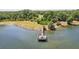 A community dock on the lake offers scenic views and easy access for fishing or boating at 17712 Long Ridge Rd, Tampa, FL 33647