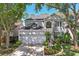 Charming two-story home with a well-manicured lawn and inviting curb appeal at 17712 Long Ridge Rd, Tampa, FL 33647