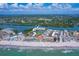 Aerial view of condo complex with arrow pointing to a specific unit at 19451 Gulf Blvd # 506, Indian Shores, FL 33785