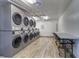 Clean laundry room with multiple machines at 19451 Gulf Blvd # 506, Indian Shores, FL 33785