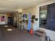 Garage featuring storage shelves, workbench, and access to the home at 2043 Ketch Cir, Palm Harbor, FL 34683