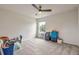 Bedroom with neutral carpet, ceiling fan, and natural light at 20472 Monza Loop, Land O Lakes, FL 34638