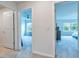 Upstairs hallway with views to bedrooms and bathrooms at 20472 Monza Loop, Land O Lakes, FL 34638
