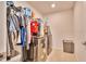 Laundry room with side-by-side washer and dryer and storage at 20472 Monza Loop, Land O Lakes, FL 34638