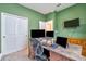 This office contains an executive desk, an ergonomic chair, and ample closet space for optimal productivity at 20472 Monza Loop, Land O Lakes, FL 34638