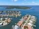 Stunning aerial view of waterfront homes, showcasing beautiful waterways and community features in a coastal Florida setting at 2057 Kansas Ne Ave, St Petersburg, FL 33703