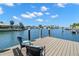 Enjoy waterfront living with this home's private dock and comfortable seating at 2057 Kansas Ne Ave, St Petersburg, FL 33703
