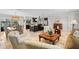 Open-concept living space with kitchen, dining area, and living room, perfect for entertaining and relaxation at 2057 Kansas Ne Ave, St Petersburg, FL 33703