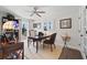 Office featuring a ceiling fan, hardwood-style floors, and a view of the exterior patio at 2057 Kansas Ne Ave, St Petersburg, FL 33703