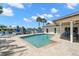 Private backyard pool with waterfront views and comfortable outdoor seating area at 2057 Kansas Ne Ave, St Petersburg, FL 33703