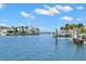 Gorgeous waterfront view featuring a private dock, boat lift, and serene surroundings at 2057 Kansas Ne Ave, St Petersburg, FL 33703