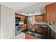 Beautiful kitchen with granite countertops and stainless steel appliances at 2141 Brent Pl, Palm Harbor, FL 34683