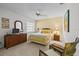 Bedroom with ceiling fan, sunny window, decorated with charming decor at 235 Woodridge Cir, Oldsmar, FL 34677