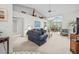 Spacious living room featuring high ceilings and a combined living and dining space at 235 Woodridge Cir, Oldsmar, FL 34677