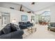 Bright living room featuring high ceilings and a combined living and dining area at 235 Woodridge Cir, Oldsmar, FL 34677