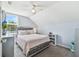 Bright bedroom with bed, closet and dresser at 24231 Satinwood Ct, Lutz, FL 33559