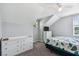 Bright bedroom with two dressers at 24231 Satinwood Ct, Lutz, FL 33559