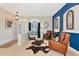 Comfortable living room with tile flooring, neutral walls and ample natural light at 2875 Grazeland Dr, Sarasota, FL 34240