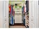Bright walk-in closet featuring custom shelving and plenty of room for organization at 2875 Grazeland Dr, Sarasota, FL 34240