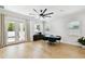 Sunlit dining area with a modern table setting and access to the outdoor patio at 3106 W Cherokee Ave, Tampa, FL 33611