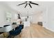 Spacious open floor plan with a modern kitchen, dining area, and comfortable living space at 3106 W Cherokee Ave, Tampa, FL 33611