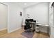 A well lit and spacious home office with modern work space at 3106 W Cherokee Ave, Tampa, FL 33611