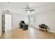 A well lit and spacious home office with modern work space and wood floors at 3106 W Cherokee Ave, Tampa, FL 33611