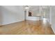 Open living area with hard surface floors and an open kitchen view at 3510 Hickory Hammock Loop, Wesley Chapel, FL 33544