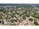 An aerial view of a neighborhood shows lots of houses and greenery from above at 511 Glenoak N St, St Petersburg, FL 33703