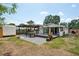 This backyard has a patio, pergola, grill, outdoor seating and is great for entertaining at 511 Glenoak N St, St Petersburg, FL 33703