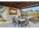 Outdoor dining area with covered patio and outdoor servery area, next to a relaxing deck area at 511 Glenoak N St, St Petersburg, FL 33703