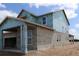 Home under construction features weather resistant home wrap to exterior walls at 5269 Everlong Dr, Apollo Beach, FL 33572
