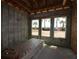 New construction room with block walls and framing, ready for drywall at 5269 Everlong Dr, Apollo Beach, FL 33572
