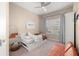 Cozy bedroom with a twin bed, neutral decor, and a comfortable window seating area at 5912 Anchorage S Way, St Petersburg, FL 33712