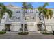 Charming townhome complex showcasing well-maintained facades, and inviting curb appeal at 5912 Anchorage S Way, St Petersburg, FL 33712