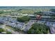 Aerial view showcasing the community layout and surrounding green spaces at 5922 Grand Sonata Ave, Lutz, FL 33558