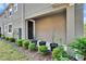 Charming front porch featuring plants and landscaping at 5922 Grand Sonata Ave, Lutz, FL 33558