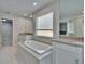 Beautiful bathroom featuring a soaking tub and dual vanities at 5922 Grand Sonata Ave, Lutz, FL 33558