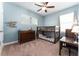 Charming bedroom with a bunk bed, wood dresser, and light blue colored walls at 6015 Shell Ridge Dr, Lithia, FL 33547