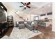 Bright living room seamlessly connects to kitchen and dining area, creating an inviting and open-concept space at 6015 Shell Ridge Dr, Lithia, FL 33547