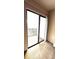 Balcony with sliding glass doors providing natural light to the bedroom at 631 Haven Pl, Tarpon Springs, FL 34689